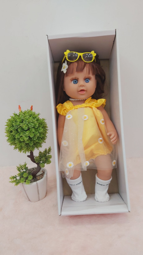 عروسک دخترانه سیلیکونی 50 سانتی موزیکال مو کاشت با جعبه کادویی