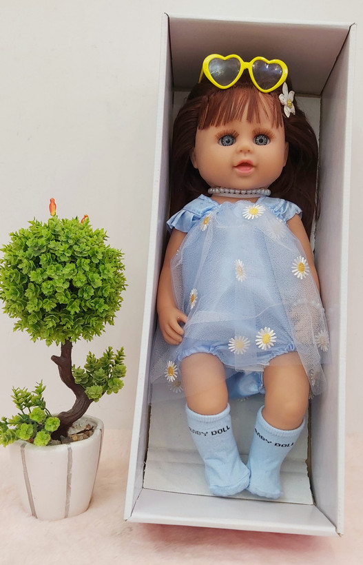 عروسک دخترانه سیلیکونی 50 سانتی موزیکال مو کاشت با جعبه کادویی
